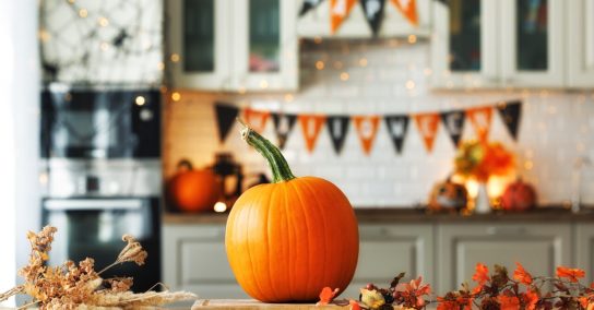 Autumn,Background,For,The,Halloween,Holiday.,Pumpkin,On,Wooden,Table